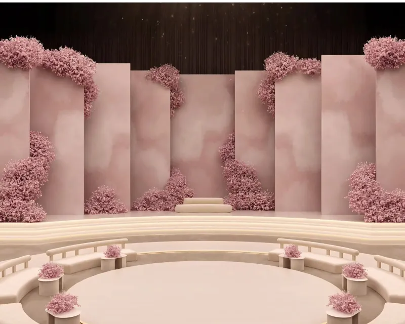 تصميم 3D لجدار وردي متدرج بالزهور وجلسات دائرية